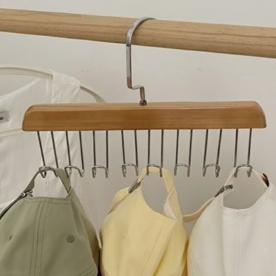 Cintres porte casquettes